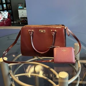 Kate Spade handbag. Brand new with matching wallet. Deep wine in color.